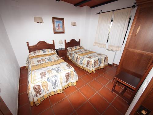 Imagen de la habitación del Apartamentos El Molino de La Quinta. Foto 5