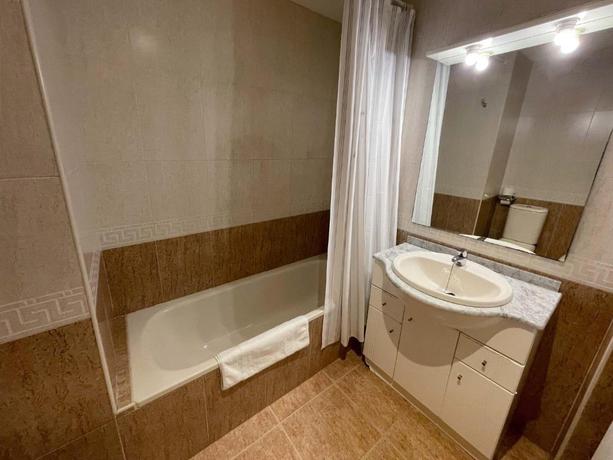 Imagen de la habitación del Apartamentos El Pilar Suites 3000. Foto 10