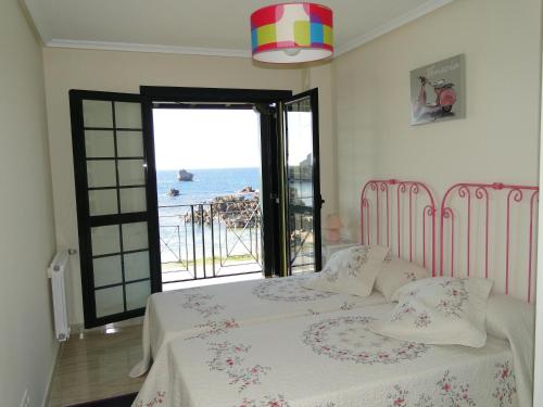 Imagen de la habitación del Apartamentos El Pinedo. Foto 8