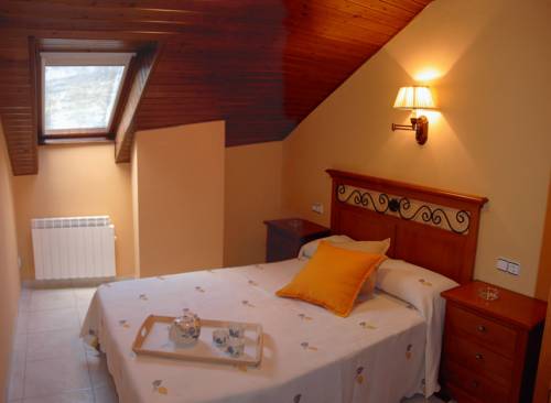 Imagen de la habitación del Apartamentos El Tarter, Bo&iacute;. Foto 13