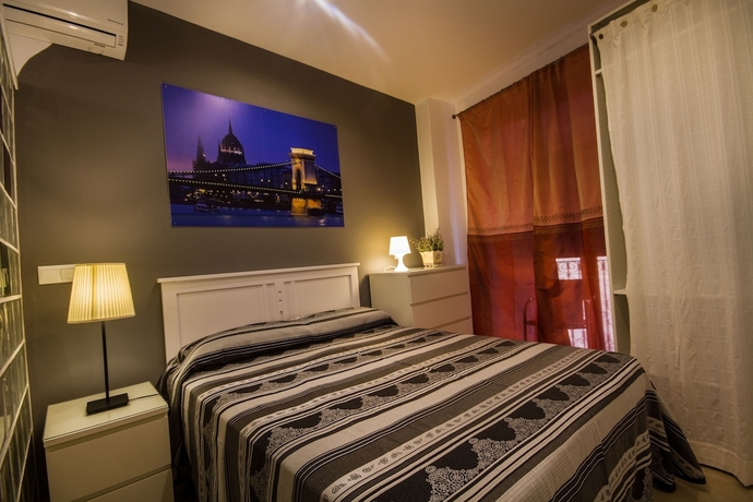 Imagen de la habitación del Apartamentos El Templo Suites. Foto 3