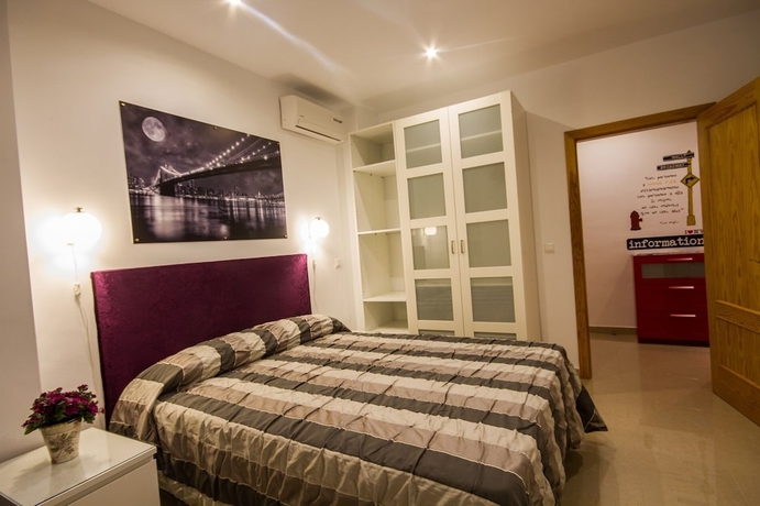 Imagen de la habitación del Apartamentos El Templo Suites. Foto 6