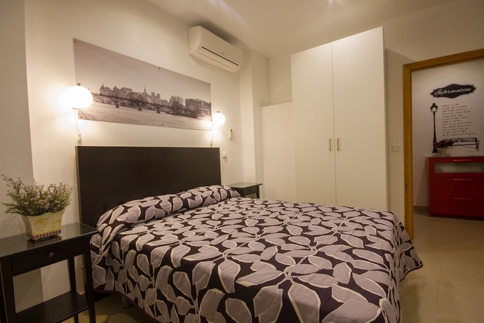 Imagen de la habitación del Apartamentos El Templo Suites. Foto 7