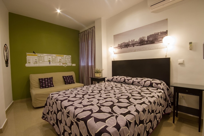 Imagen de la habitación del Apartamentos El Templo Suites. Foto 8