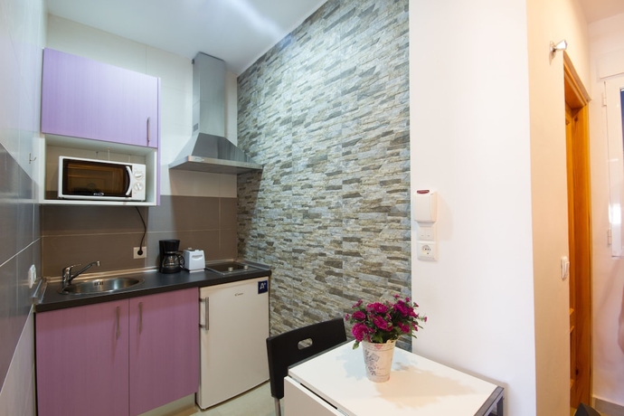 Imagen de la habitación del Apartamentos El Templo Suites. Foto 10