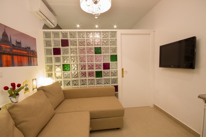 Imagen de la habitación del Apartamentos El Templo Suites. Foto 13