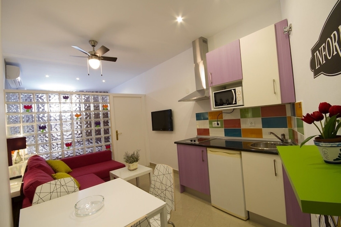 Imagen de la habitación del Apartamentos El Templo Suites. Foto 14