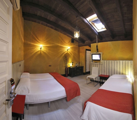 Imagen de la habitación del Apartamentos El Tiempo. Foto 8