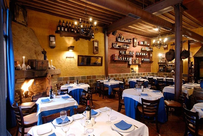 Imagen del bar/restaurante del Apartamentos El Tiempo. Foto 4