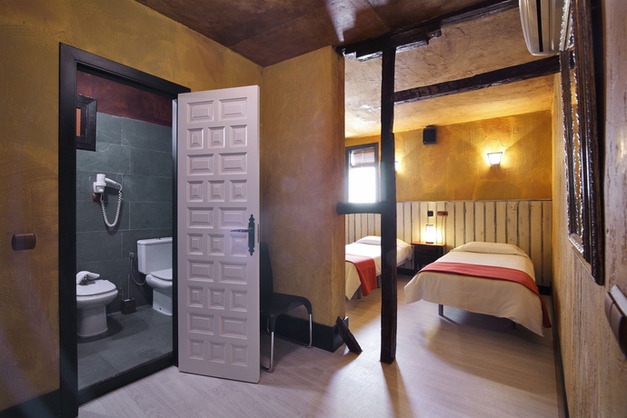 Imagen de la habitación del Apartamentos El Tiempo. Foto 11