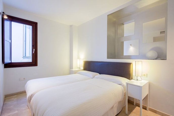 Imagen de la habitación del Apartamentos Elvira Suites. Foto 6