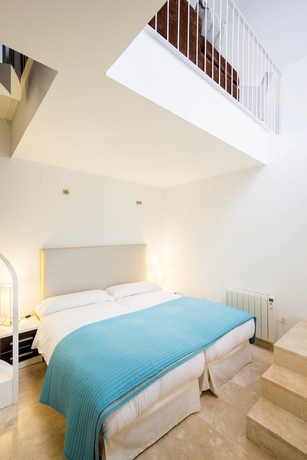 Imagen de la habitación del Apartamentos Elvira Suites. Foto 7