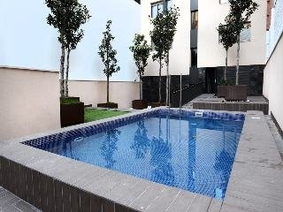Imagen de la piscina del Apartamentos Enjoybcn Patio de Gracia. Foto 15