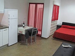 Imagen de la habitación del Apartamentos Estudios en la playa. Foto 8