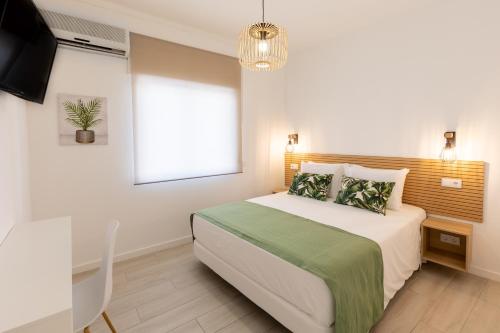 Imagen de la habitación del Apartamentos Faro Guest. Foto 18