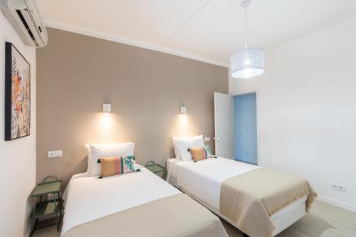 Imagen de la habitación del Apartamentos Faro Guest. Foto 19