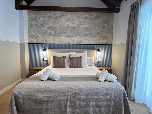 Imagen de la habitación del Apartamentos Feelathome Palacio de &Aacute;lamos. Foto 7