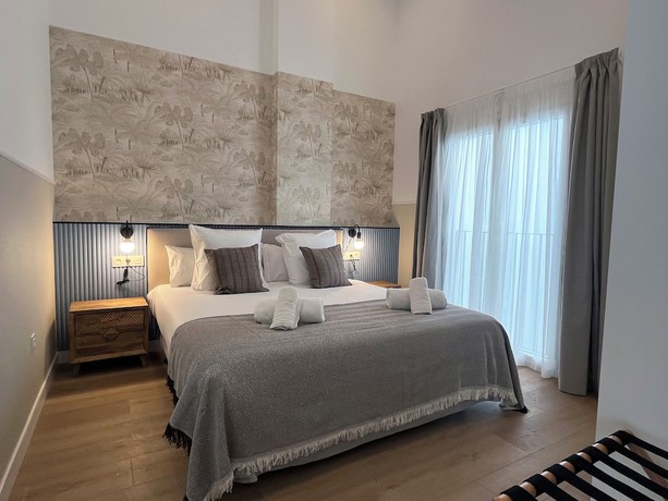 Imagen de la habitación del Apartamentos Feelathome Palacio de &Aacute;lamos. Foto 8