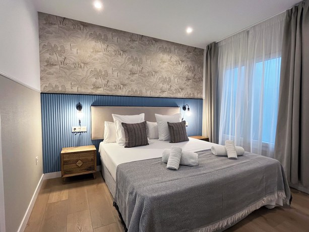 Imagen de la habitación del Apartamentos Feelathome Palacio de &Aacute;lamos. Foto 11