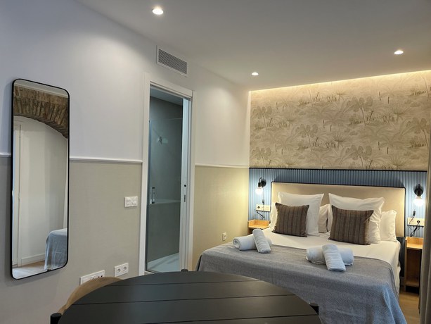 Imagen de la habitación del Apartamentos Feelathome Palacio de &Aacute;lamos. Foto 14