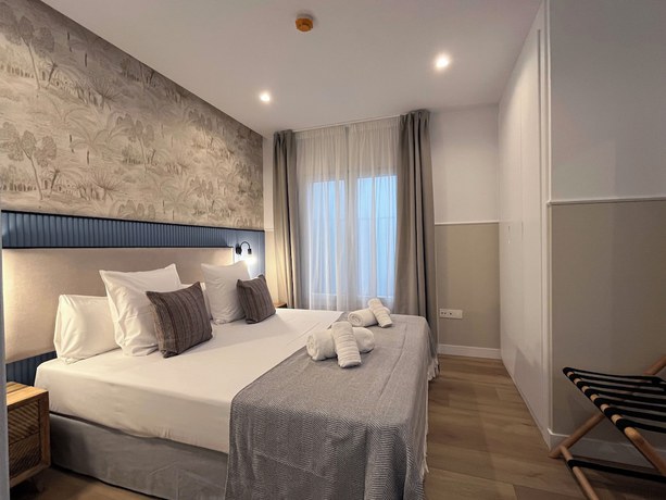 Imagen de la habitación del Apartamentos Feelathome Palacio de &Aacute;lamos. Foto 15