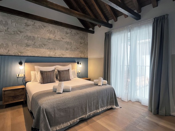 Imagen de la habitación del Apartamentos Feelathome Palacio de &Aacute;lamos. Foto 16