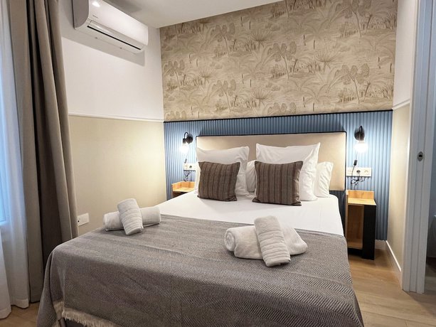 Imagen de la habitación del Apartamentos Feelathome Palacio de &Aacute;lamos. Foto 19
