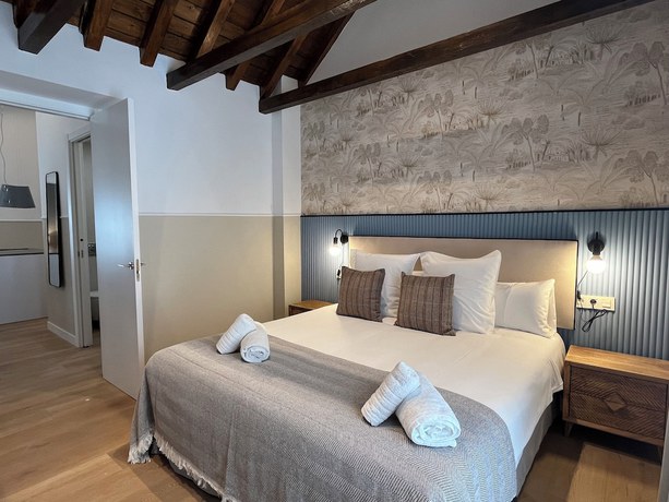 Imagen de la habitación del Apartamentos Feelathome Palacio de &Aacute;lamos. Foto 21