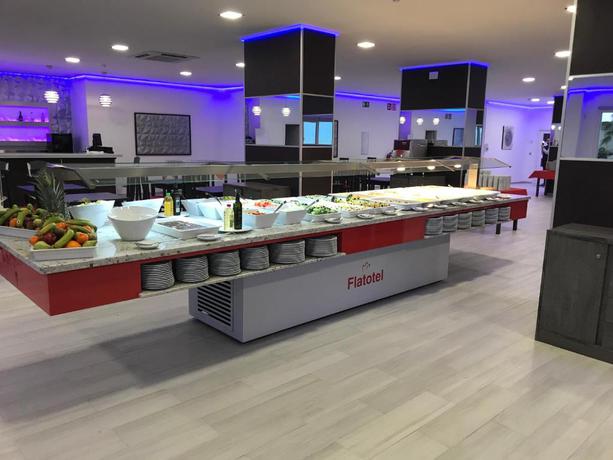Imagen del bar/restaurante del Apartamentos First Flatotel Internacional. Foto 4