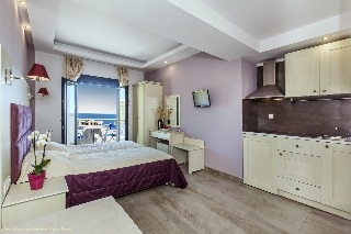 Imagen de la habitación del Apartamentos Frini Studios. Foto 11