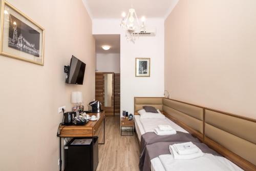 Imagen de la habitación del Apartamentos G12 Aparthotel. Foto 9