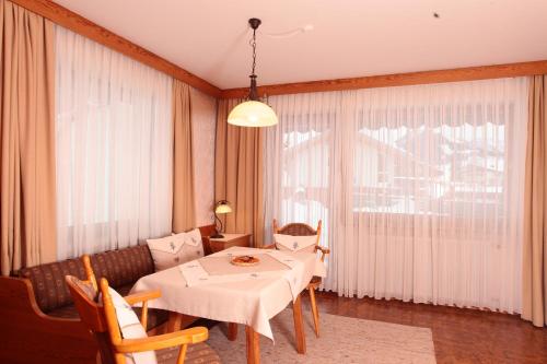 Imagen de la habitación del Apartamentos G&auml;stehaus Etschmann. Foto 6