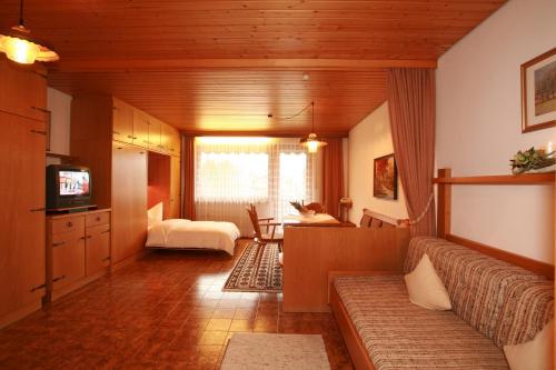 Imagen de la habitación del Apartamentos G&auml;stehaus Etschmann. Foto 7