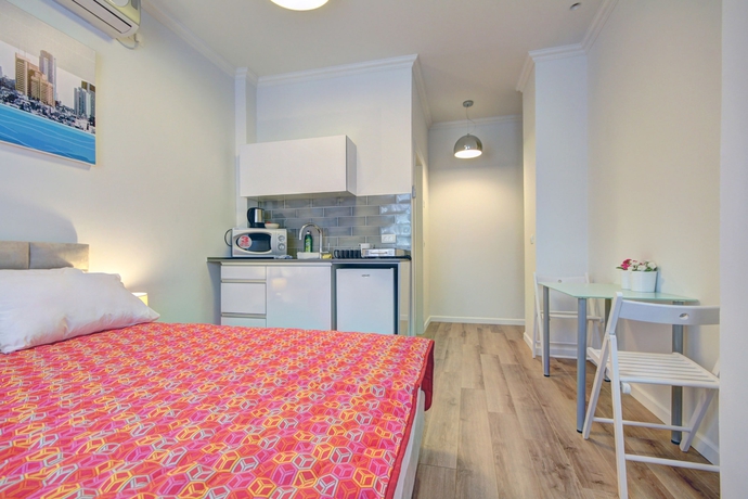 Imagen de la habitación del Apartamentos Geula Beach Boutique. Foto 10