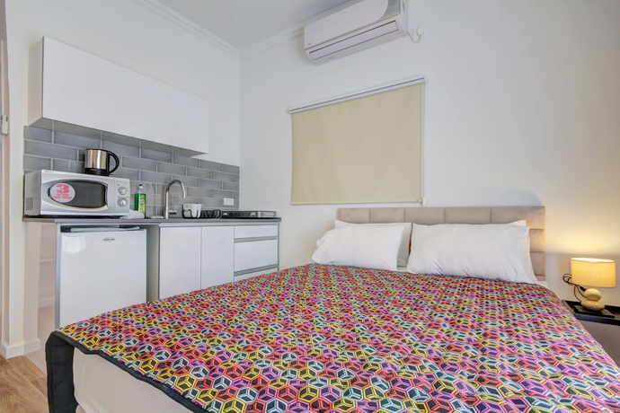 Imagen de la habitación del Apartamentos Geula Beach Boutique. Foto 15
