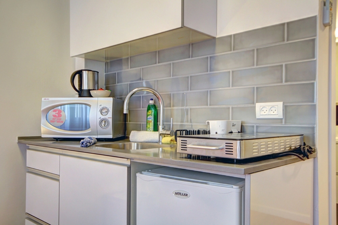 Imagen de la habitación del Apartamentos Geula Beach Boutique. Foto 19