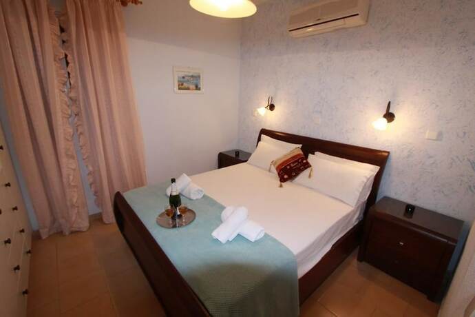 Imagen de la habitación del Apartamentos Glyfada Beach - Menigos Resort. Foto 15