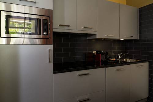 Imagen de la habitación del Apartamentos Golden Mansion Aparthotel. Foto 8