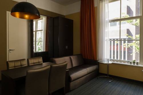 Imagen de la habitación del Apartamentos Golden Mansion Aparthotel. Foto 10