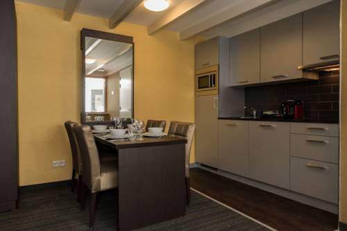 Imagen de la habitación del Apartamentos Golden Mansion Aparthotel. Foto 11