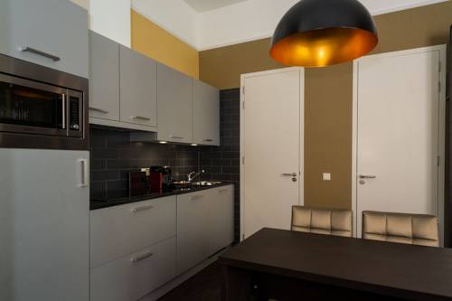 Imagen de la habitación del Apartamentos Golden Mansion Aparthotel. Foto 18