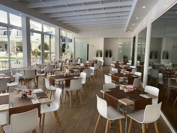 Imagen del bar/restaurante del Apartamentos Grupotel Cinco Plazas. Foto 3