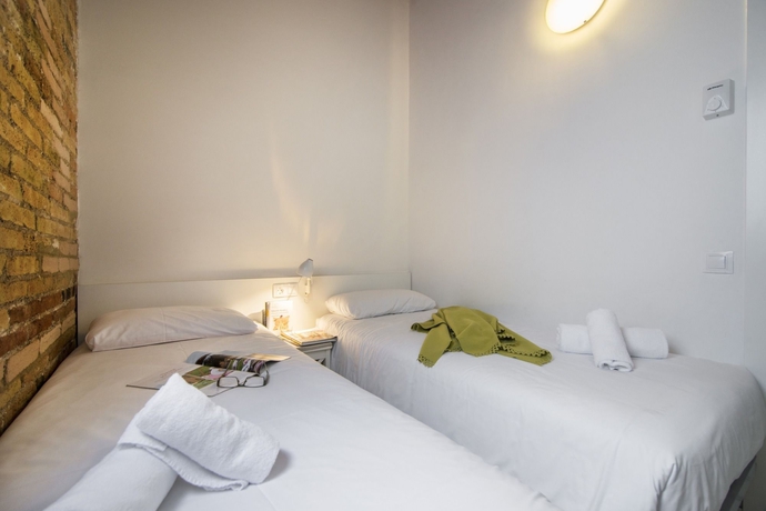 Imagen de la habitación del Apartamentos Happy People Sagrada Familia Apartments. Foto 11