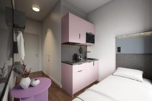 Imagen de la habitación del Apartamentos Homaris K48 Studios. Foto 3