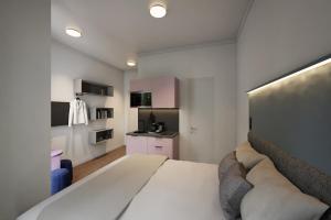 Imagen de la habitación del Apartamentos Homaris K48 Studios. Foto 4