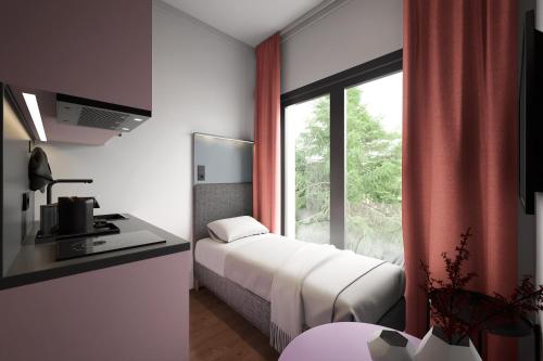 Imagen de la habitación del Apartamentos Homaris K48 Studios. Foto 7
