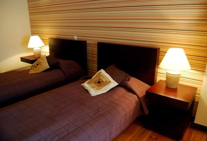 Imagen de la habitación del Apartamentos Home and Travel Apartments. Foto 24
