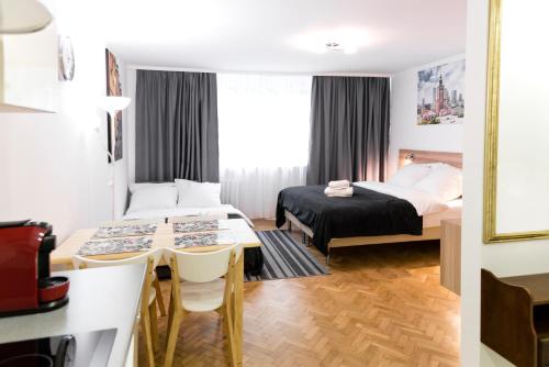 Imagen de la habitación del Apartamentos Hosapartments City Center. Foto 2