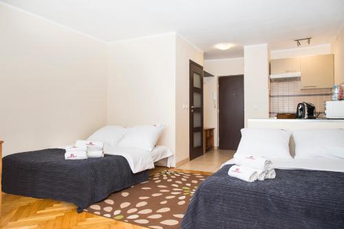 Imagen de la habitación del Apartamentos Hosapartments City Center. Foto 3