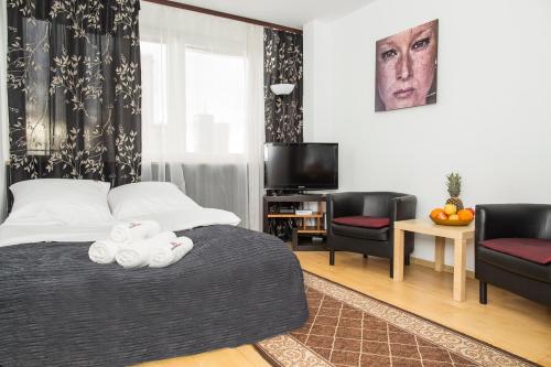 Imagen de la habitación del Apartamentos Hosapartments City Center. Foto 9